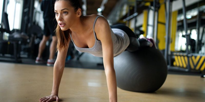 fit-girl-workout-with-fitness-ball-in-gym-sport-helath-fitness-lifestyle-concept-1.jpg