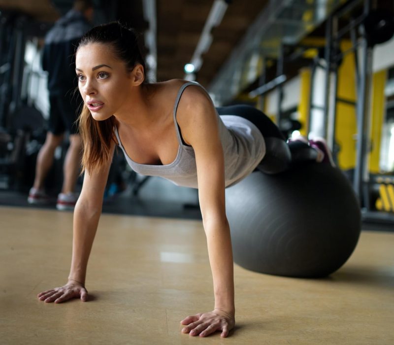 fit-girl-workout-with-fitness-ball-in-gym-sport-helath-fitness-lifestyle-concept-1.jpg
